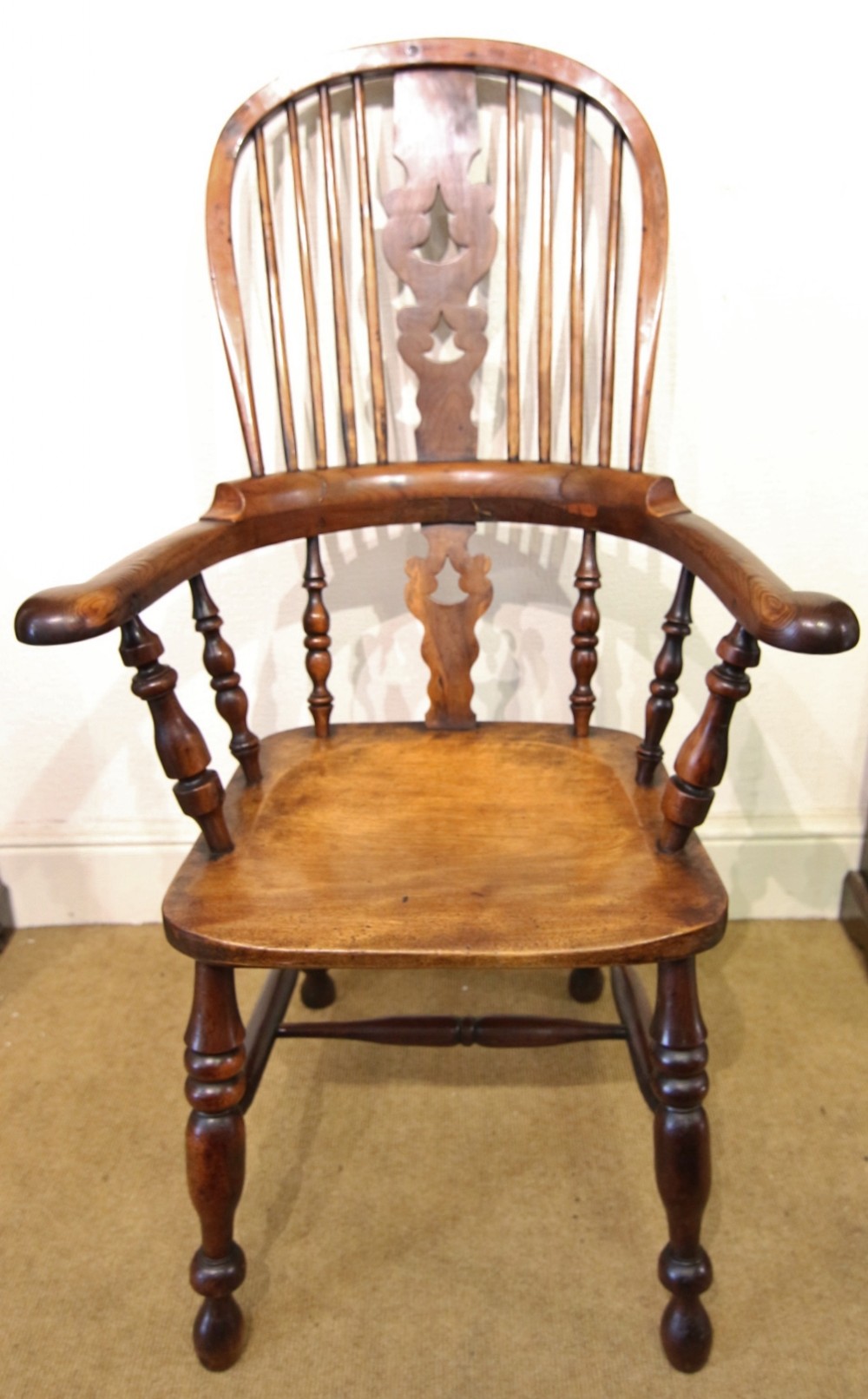 19th century broad arm yew wood windsor armchair