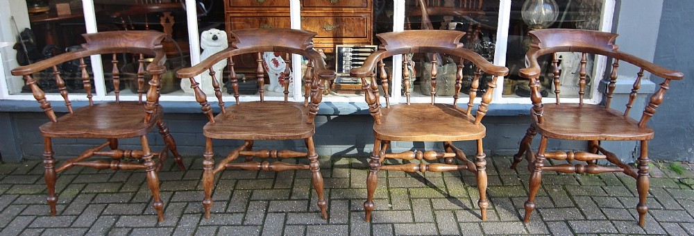 a sturdy set of four 19th century captains chairs smokers bow