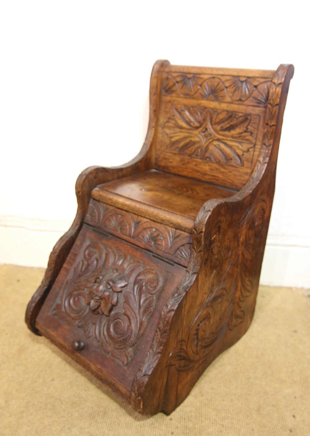 19th century gothic oak coal scuttle with seat