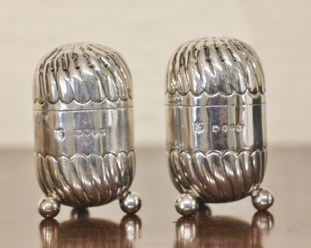19th century solid silver pepper pots