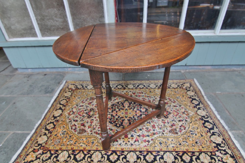 late 19th century drop leaf oak cricket table