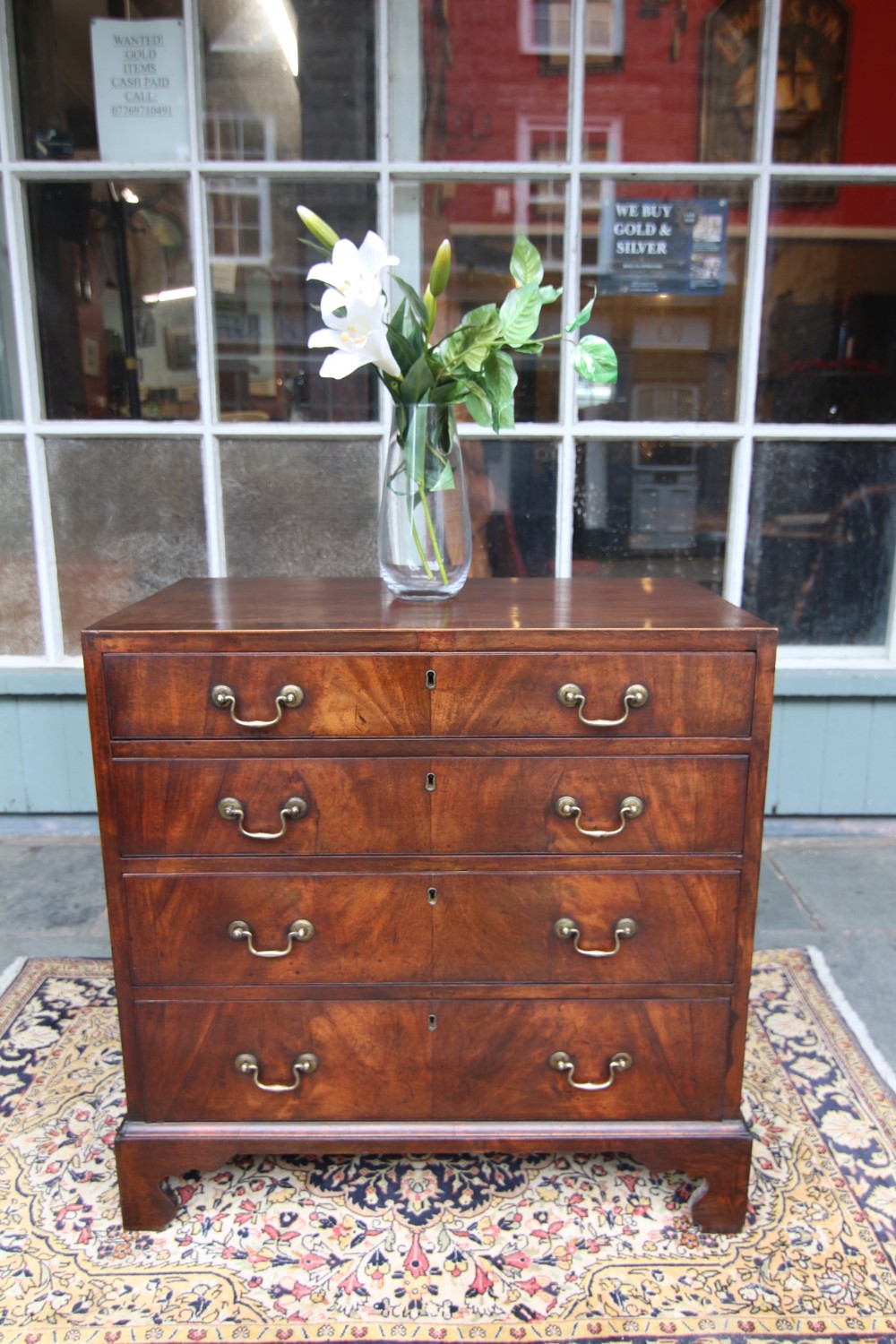 small late georgian mahogany chest of four drawers